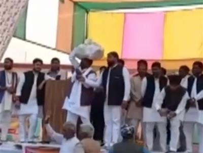 Ex-UP minister with shoes on head, appeals for community unity