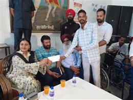 Cabinet Minister Anmol Gagan Mann hands  over financial assistance cheques  to the flood victims