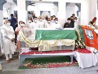 Row over BJP flag being placed over national flag